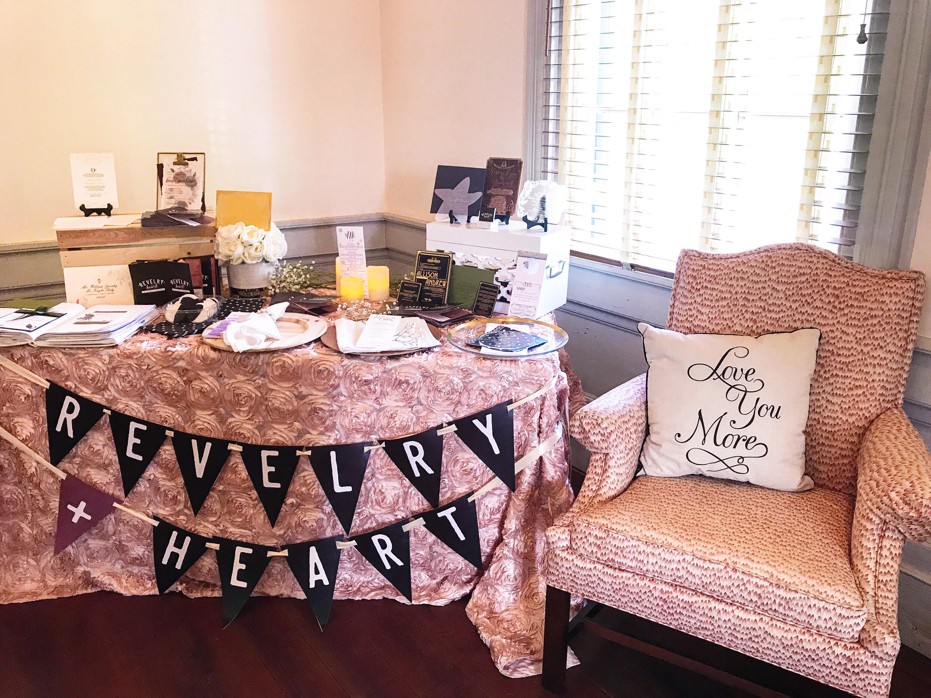 bridal showcase table with work by revelry + heart