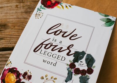 Melissa Toma Photo and Lady with a Camera Photography rescue dog wedding inspiration - love is a four letter word sign