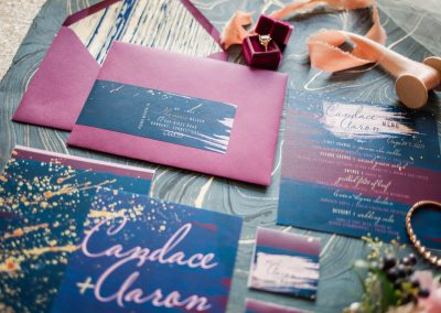 wine and navy paint splatter invitation set by revelry and heart